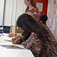 Authors writing instensely.